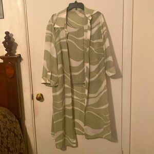 A two piece top and light dress coat